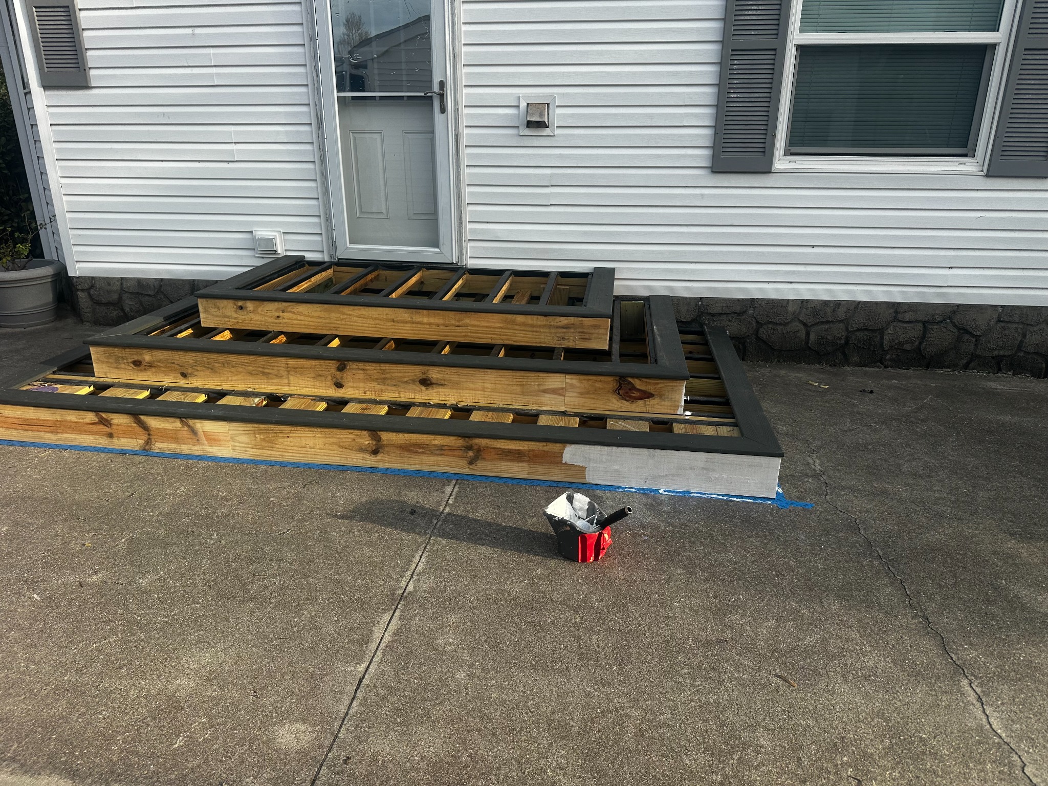 A new, wider stepped frame begins to take shape.